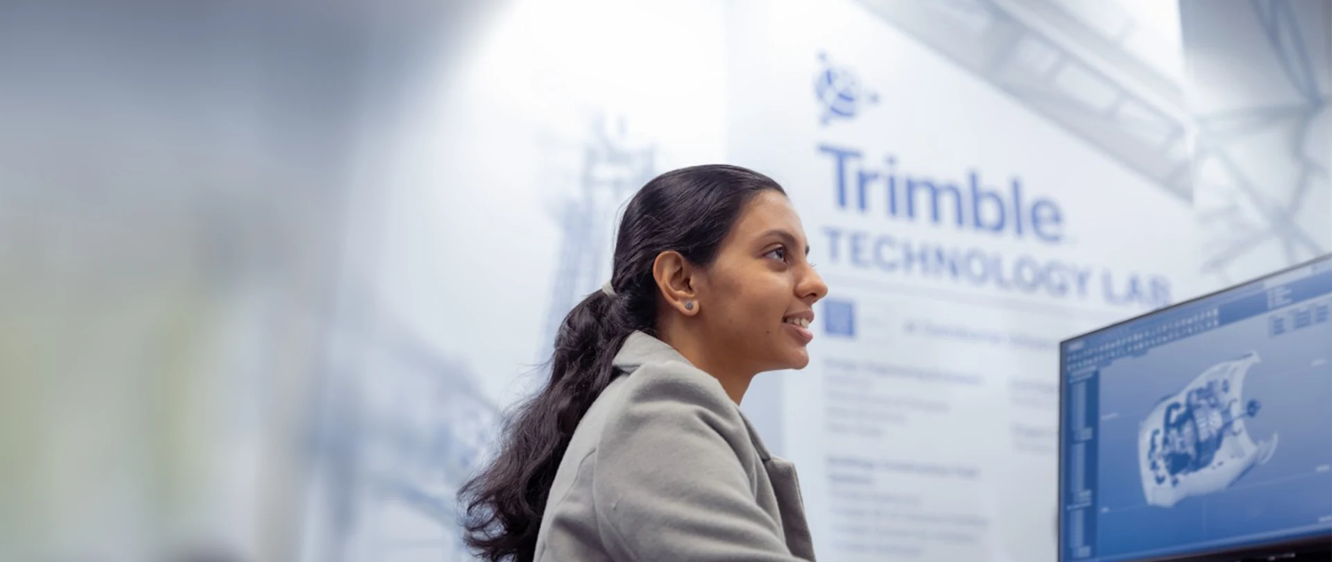 Female student at computer in Trimble Technology Lab