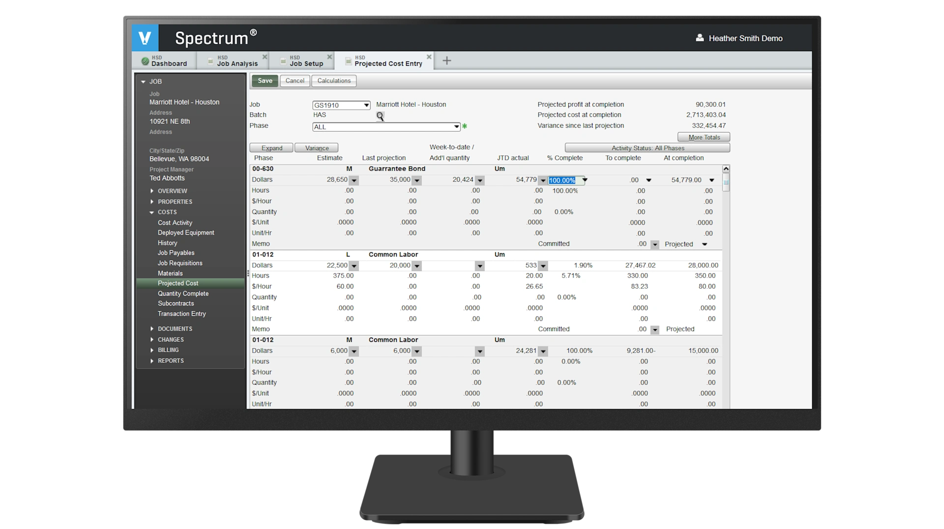 A computer monitor displays the Trimble Spectrum construction ERP software, showing projected cost entry data for a Marriott Hotel project.