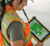 A field worker uses a Trimble T100 rugged tablet running Trimble Perspective software to manage a 3D scan on a jobsite.