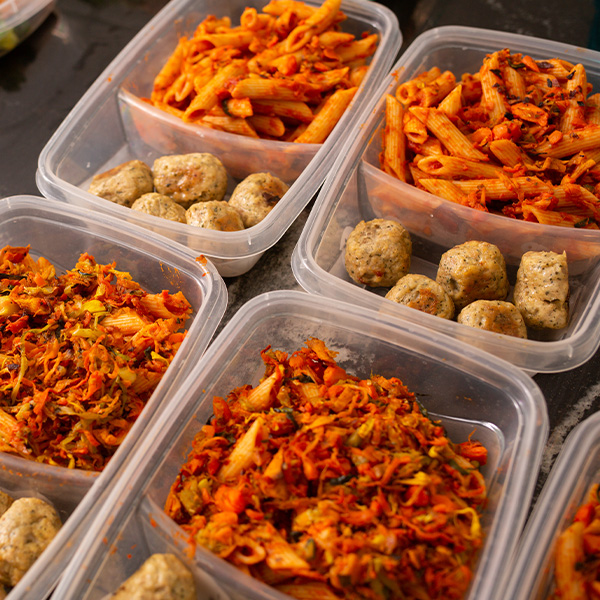 Paste with tomato sauce stains in the plastic containers