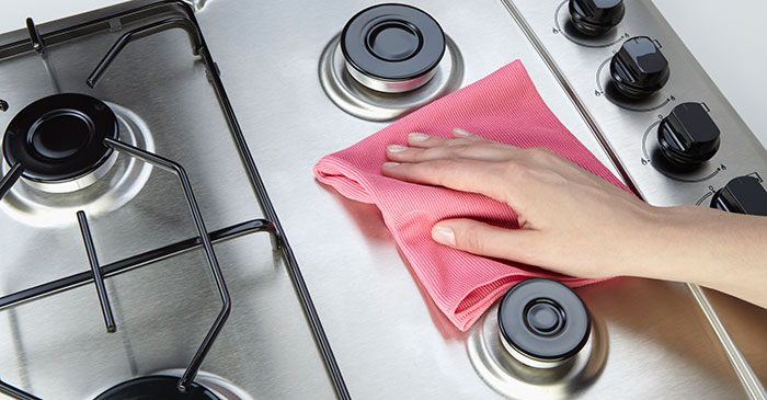 Clean stainless steel stove top