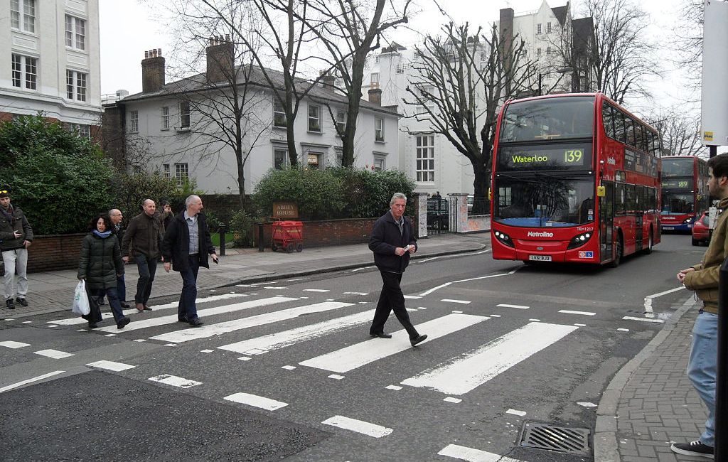 Zebra Pelican Crossing With Commuters Crossing Road London With