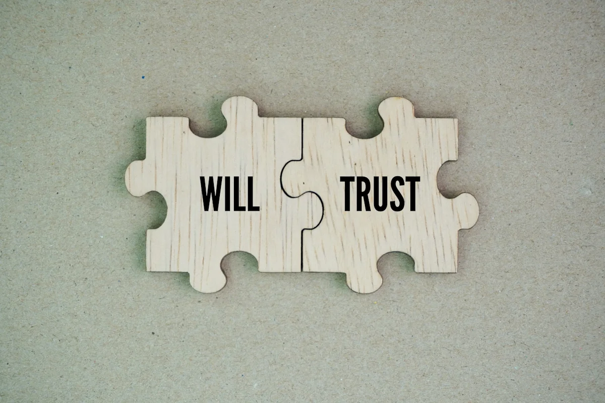 Wooden puzzle with words will and trust