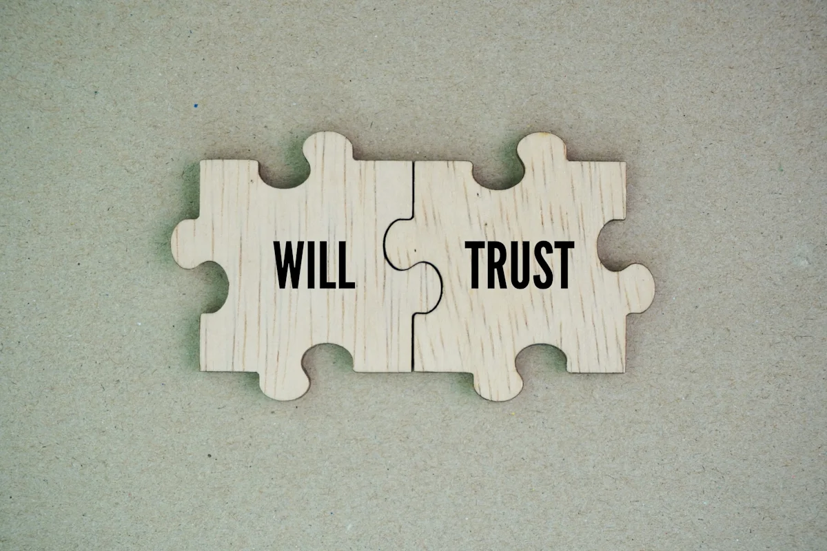 Wooden puzzle with words will and trust