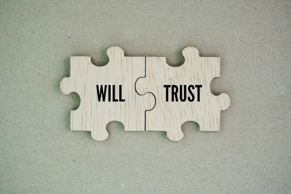 Wooden puzzle with words will and trust