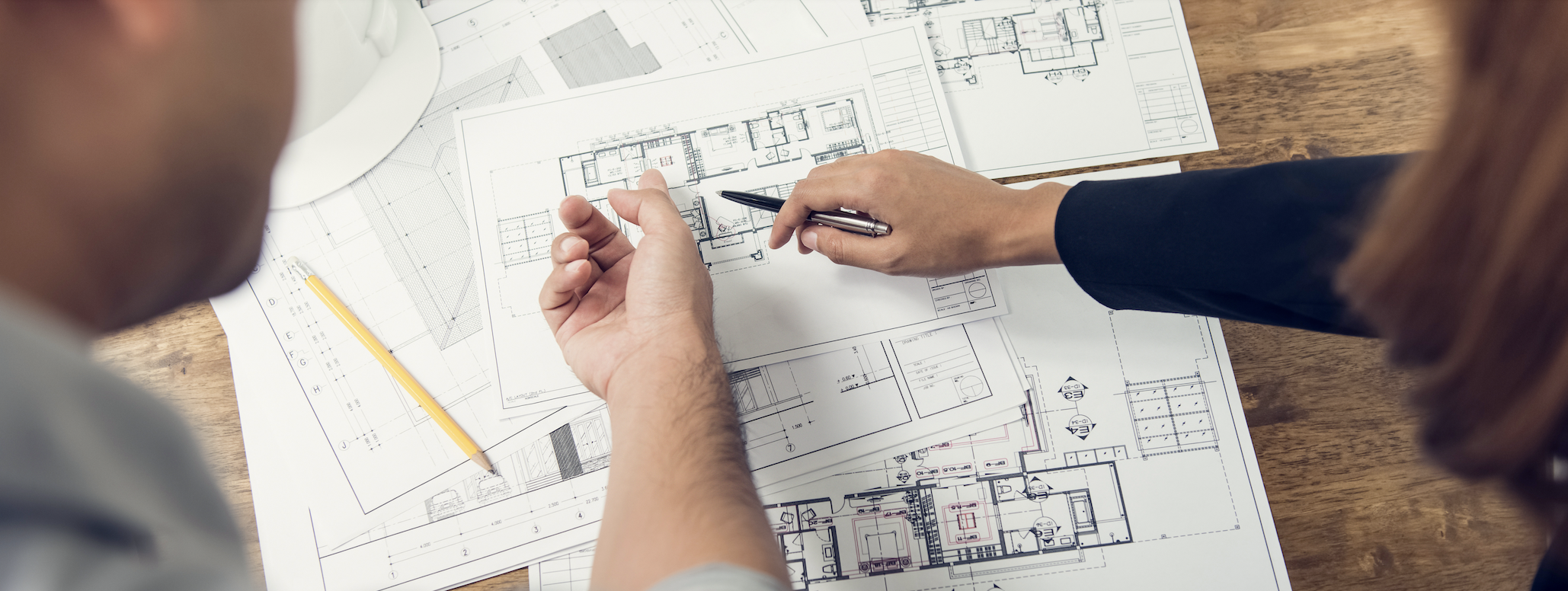 Architect discussing residential building plans with client