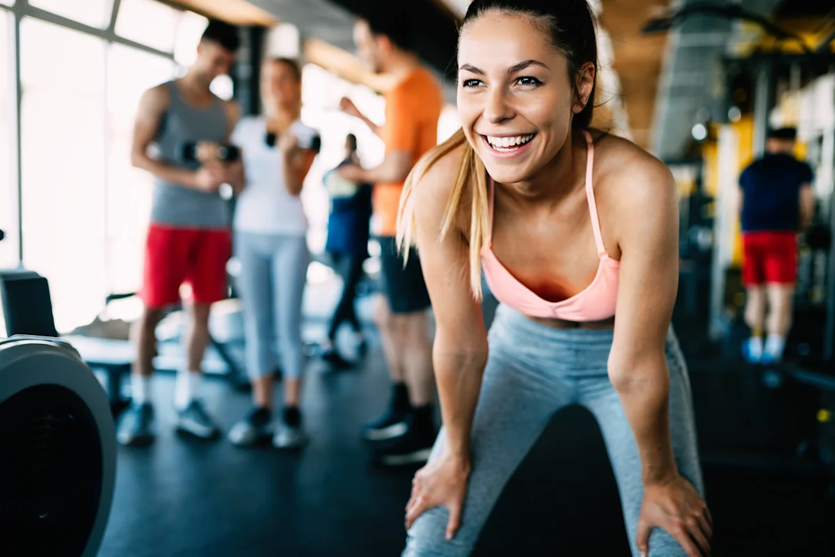 happy woman in gym