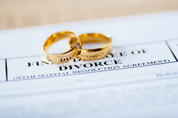 Wedding rings on divorce document
