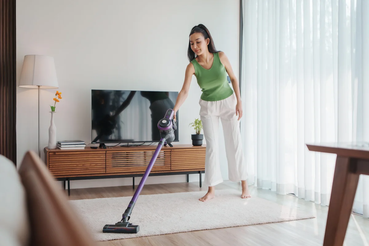 woman cleaning carpet
