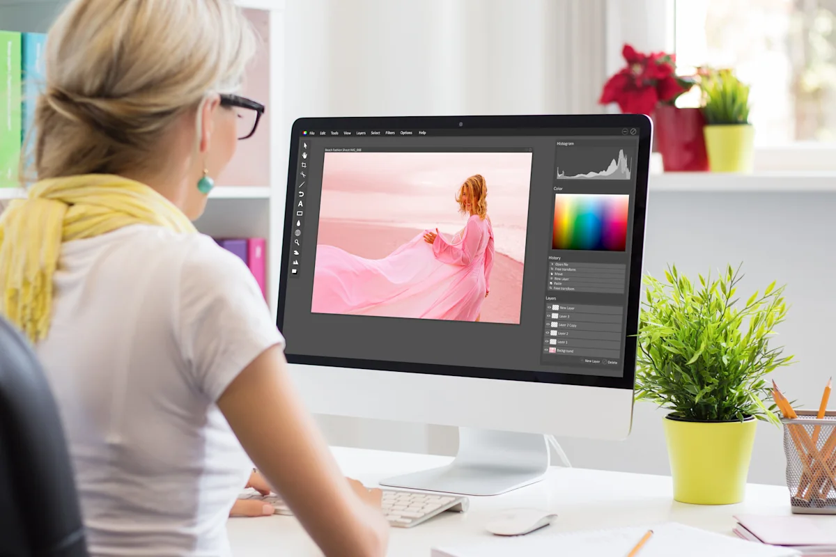 woman editing an image on her computer