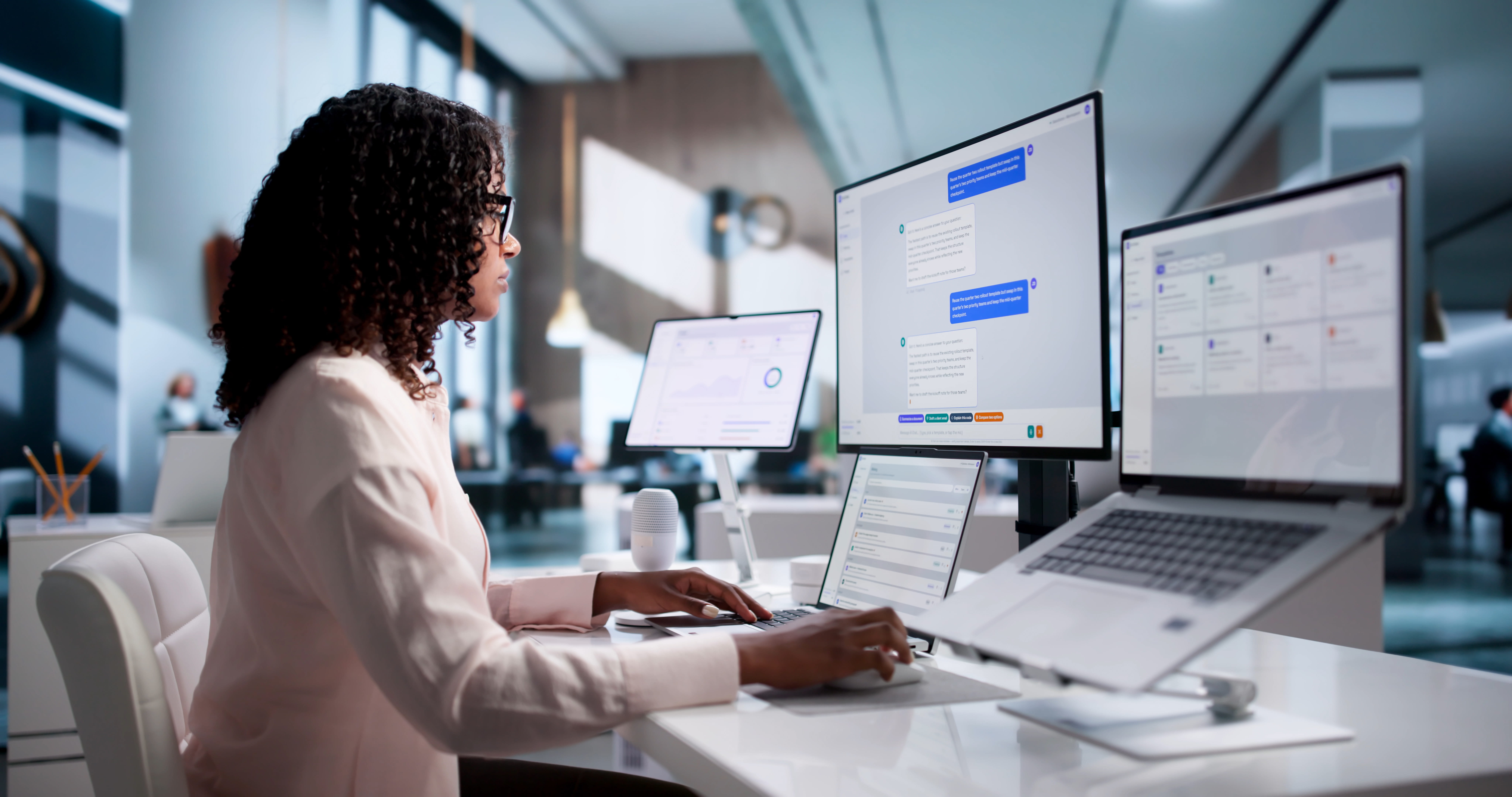 Female virtual assistant working on laptop And desktop