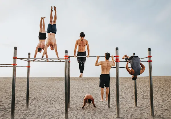 group of men doing calisthenics