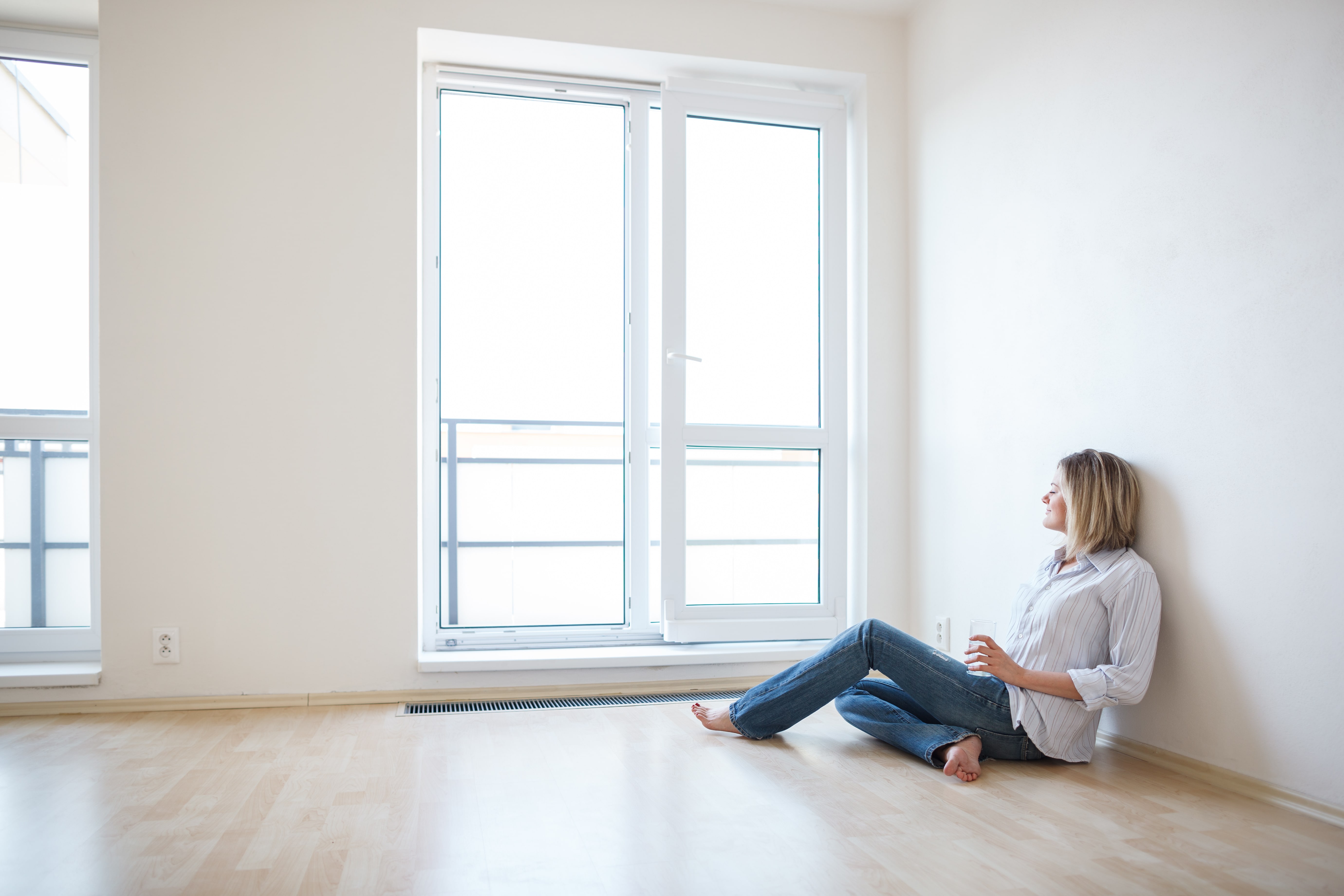 woman sitting in new house