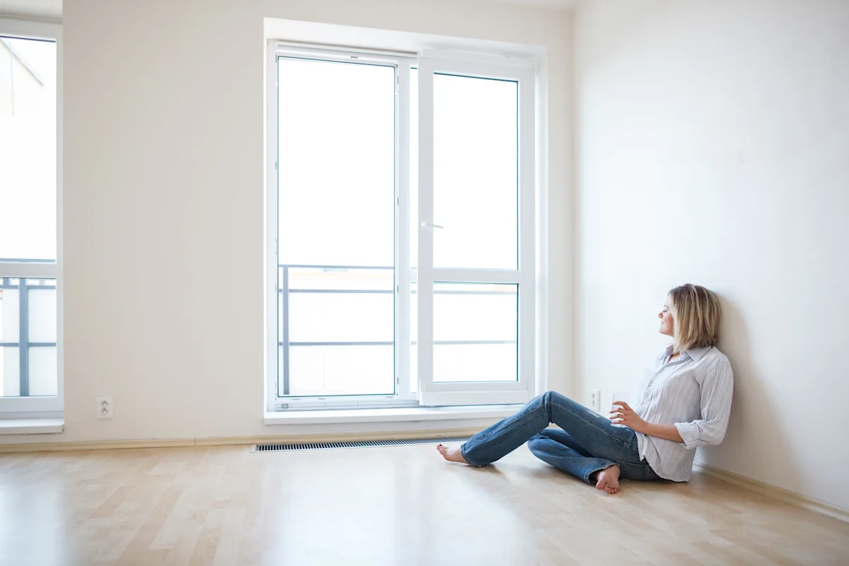 woman sitting in new house