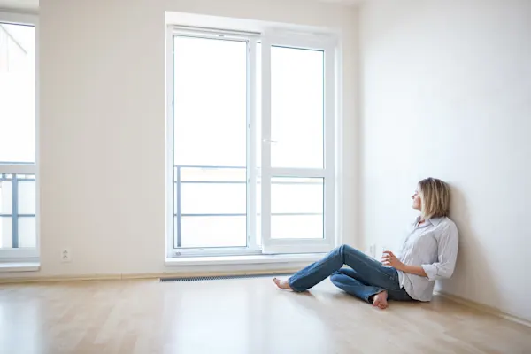 woman sitting in new house