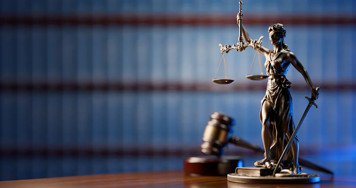 Goddess of justice and judge's gavel hammer