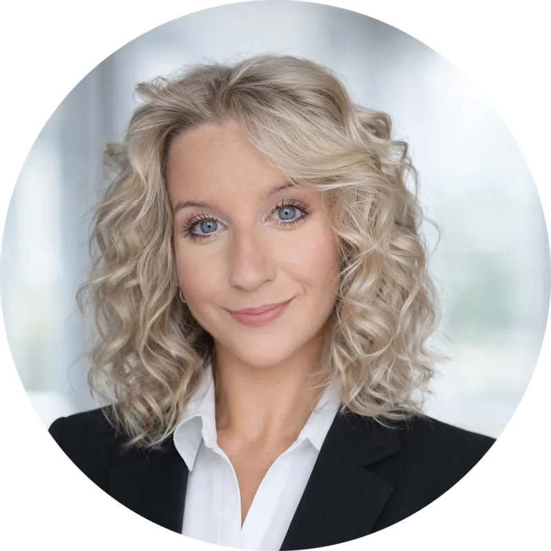 A photo of a woman in corporate dress