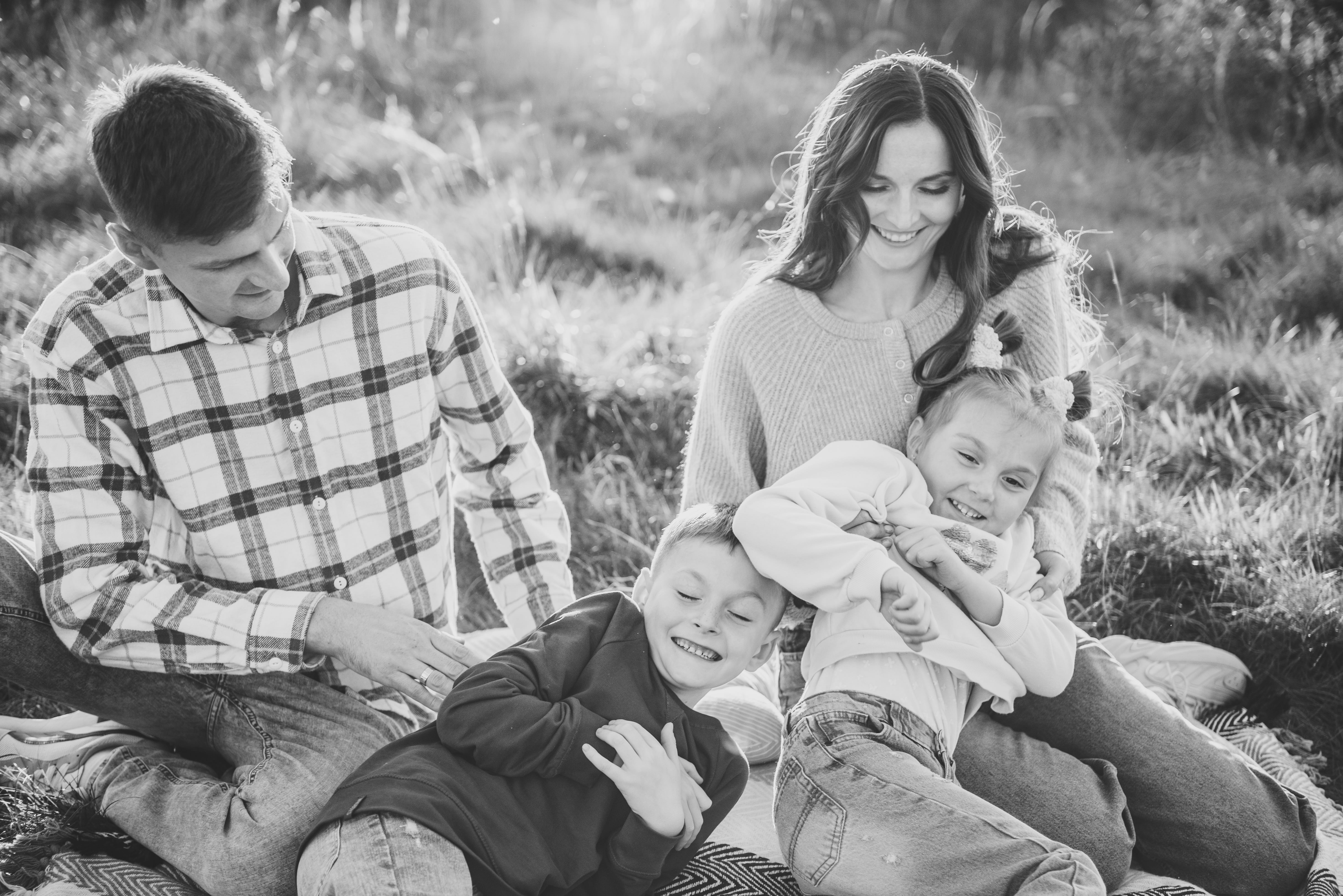 Family enjoying outdoor portrait session