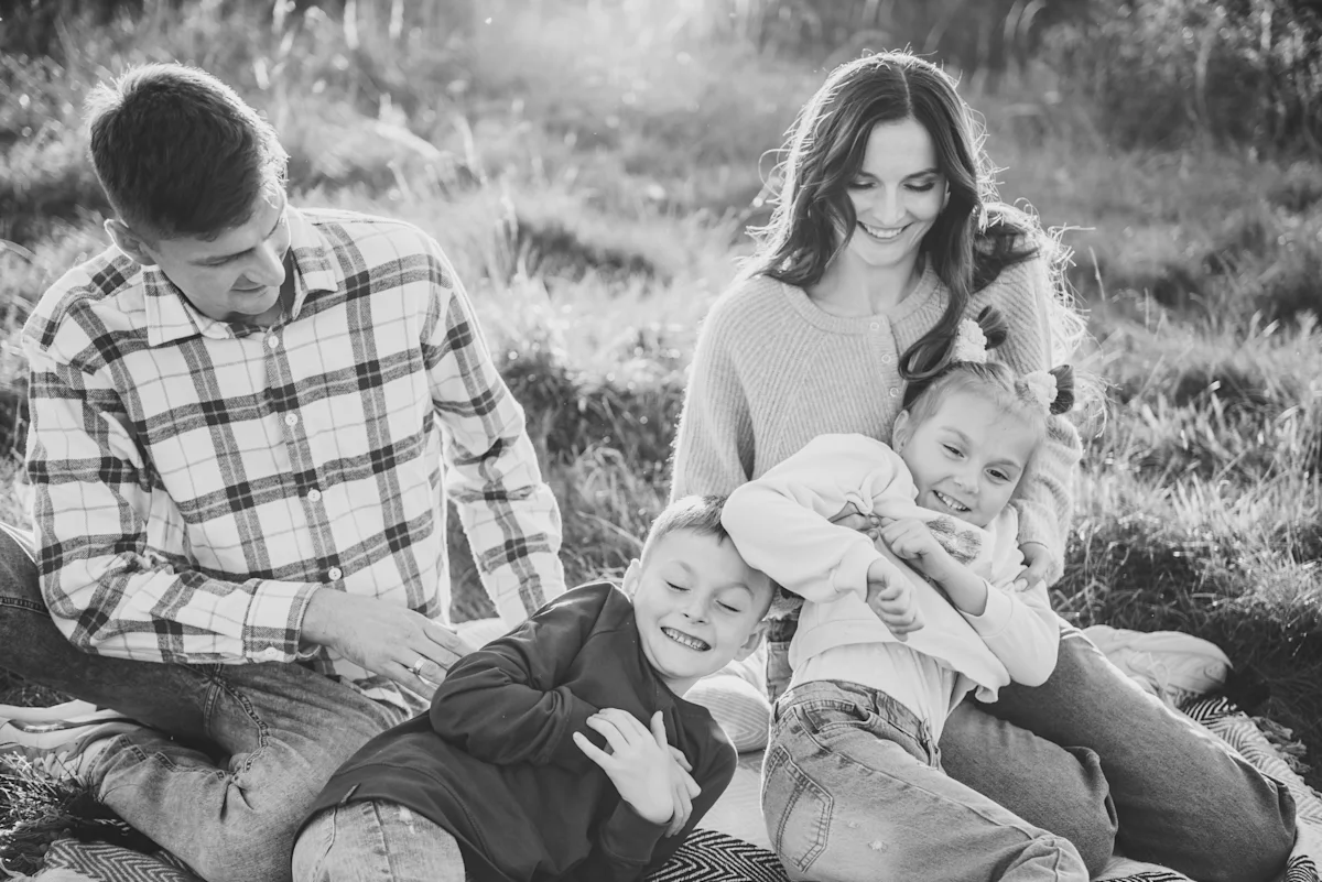 Family enjoying outdoor portrait session