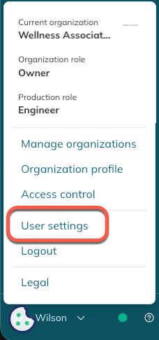 The User settings option appears in the user menu at the bottom left of the Redox dashboard.