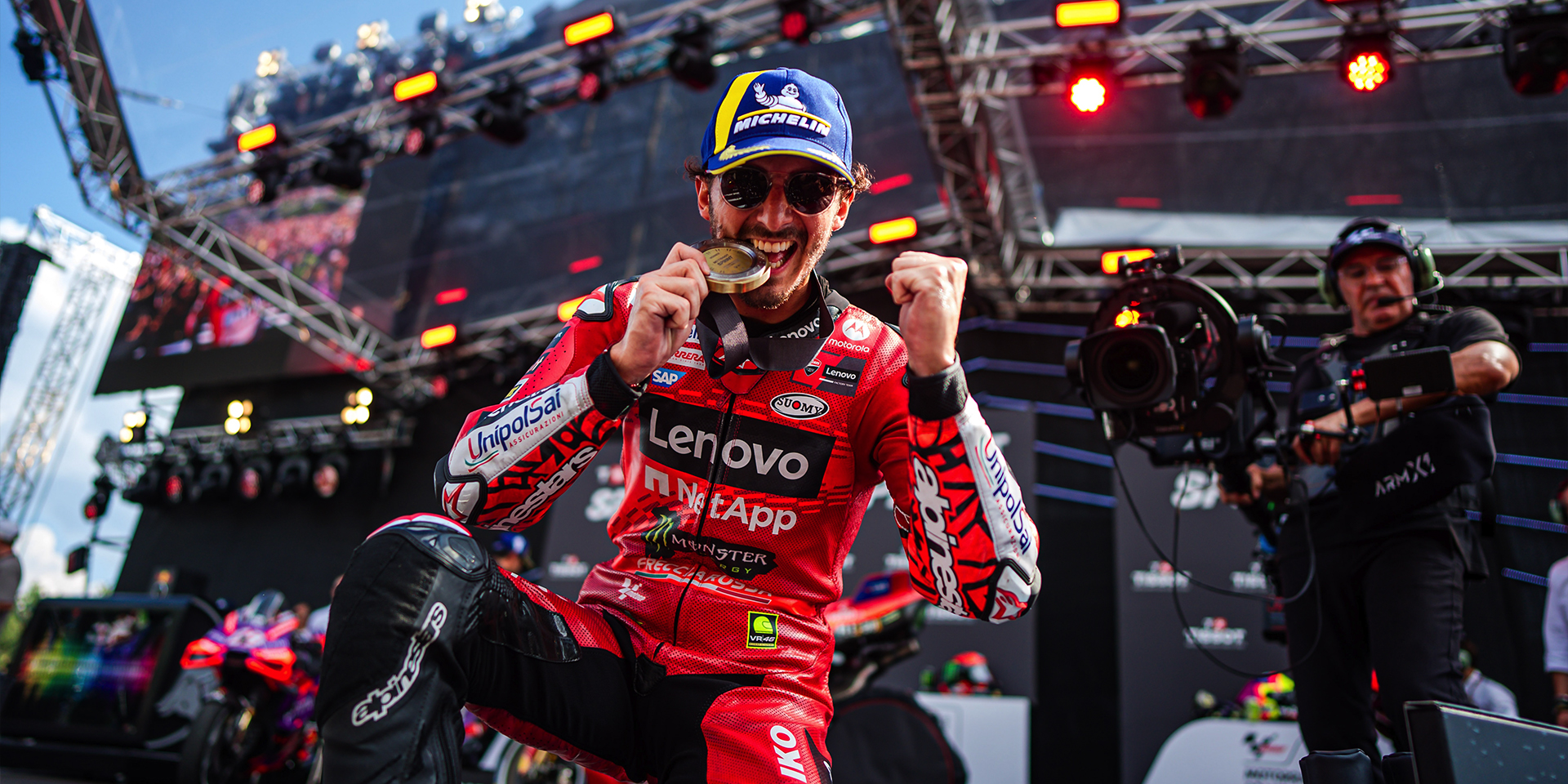 Francesco Bagnaia and the Ducati Lenovo Team atop the podium in ...