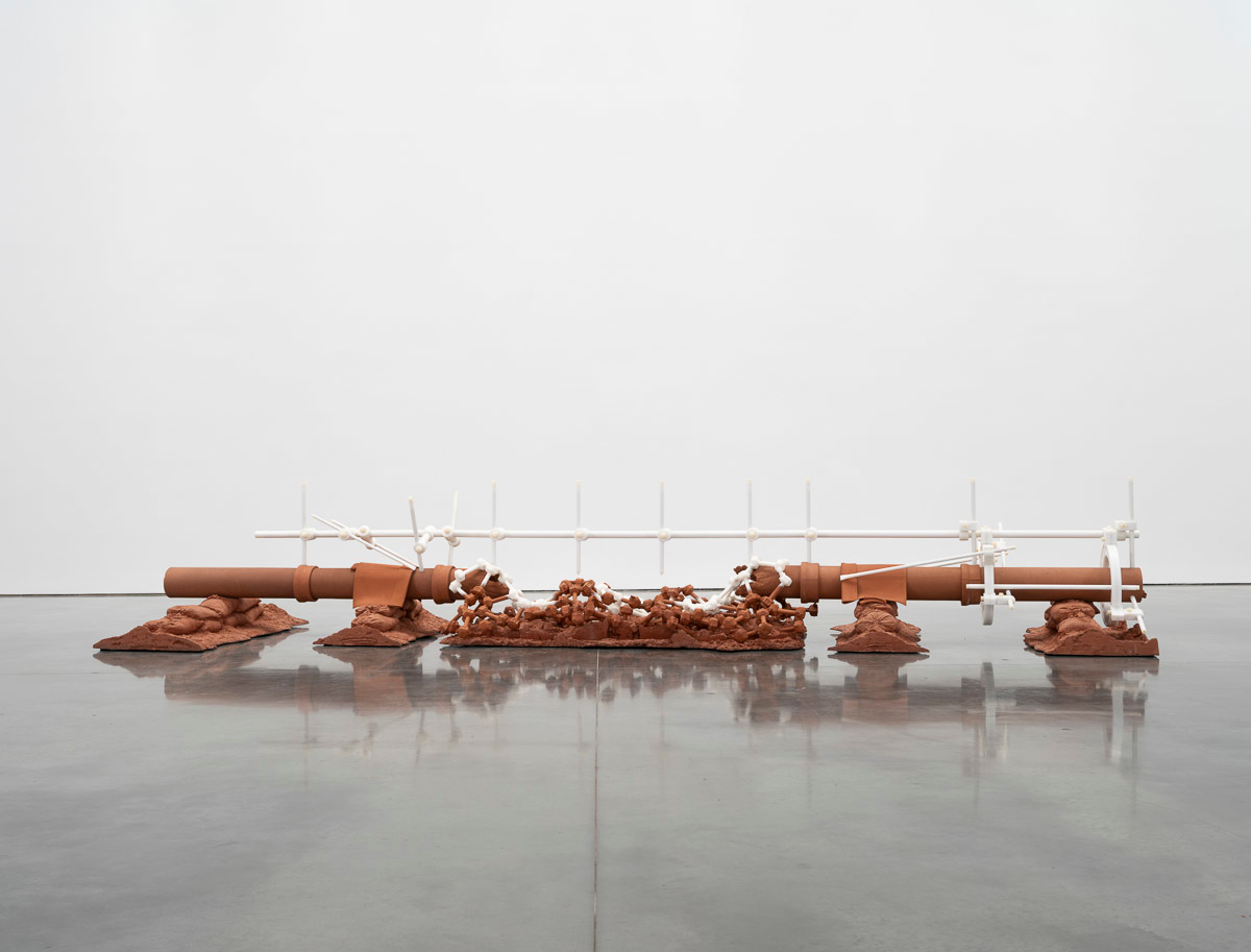 Ceramic, high-density polyethylene, synthetic polymer sculpture in a white room on a concrete floor.