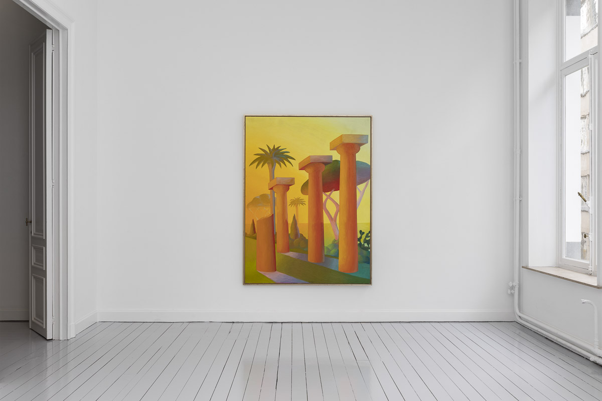 white room with gray wooden floor and one painting on the wall