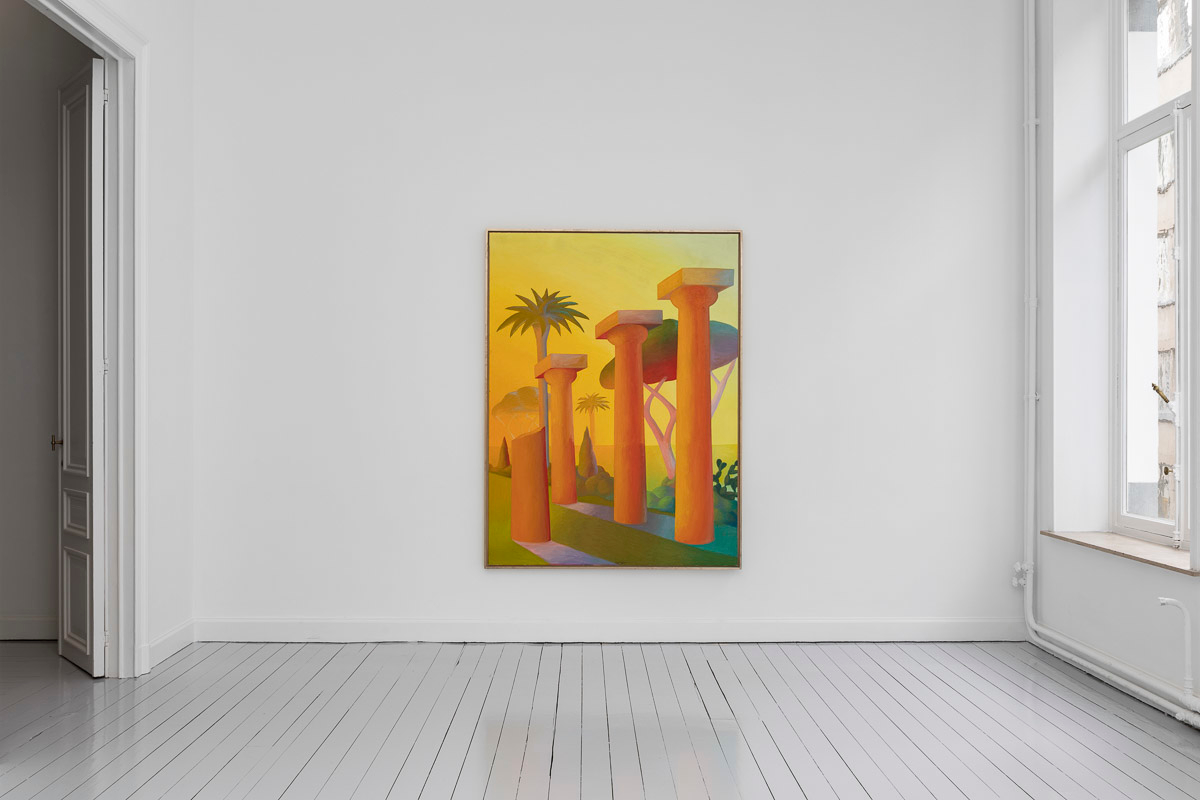 white room with gray wooden floor and one painting on the wall