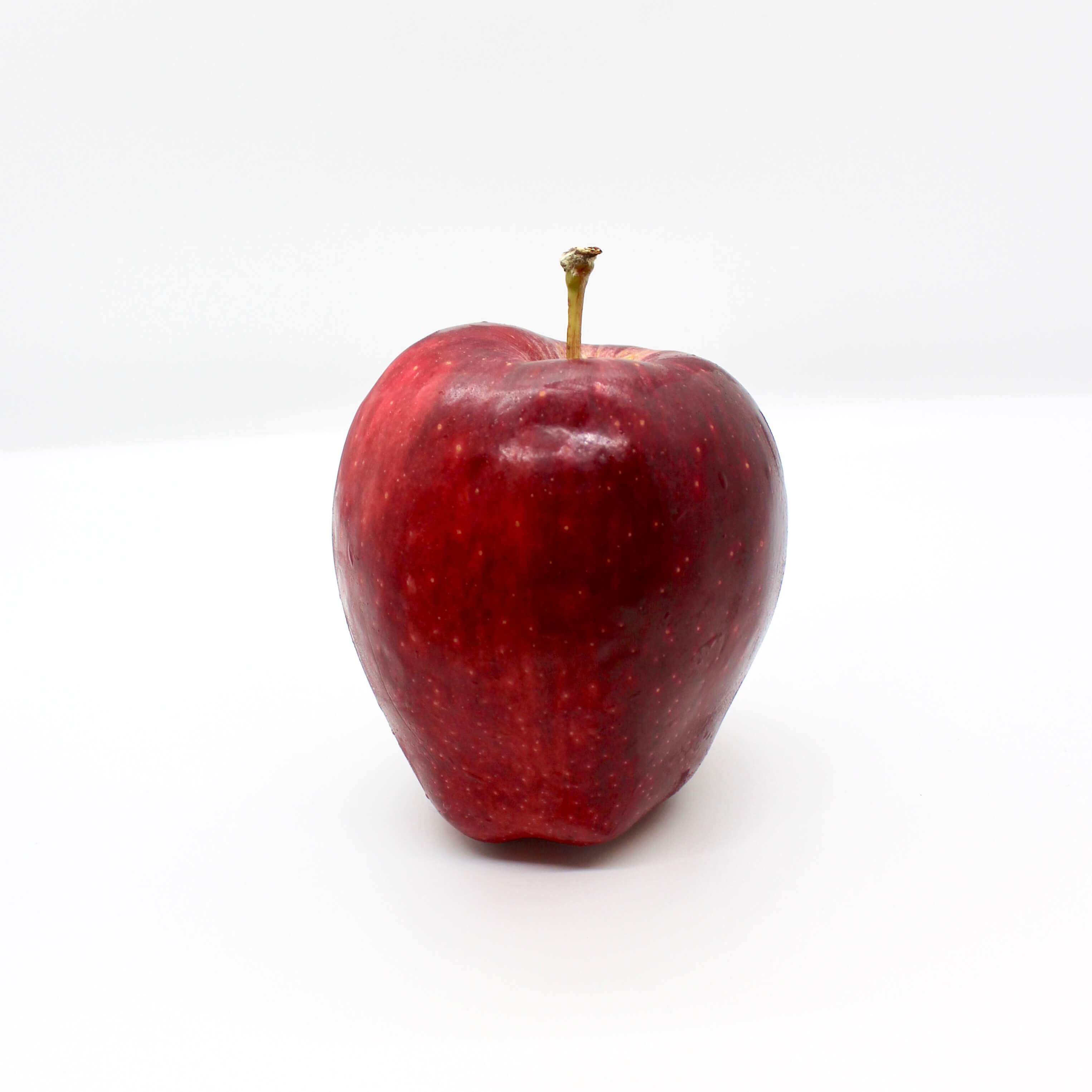 Red Delicious apple with a white background