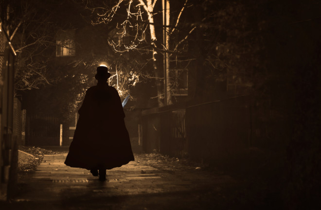 Jack the Ripper saunters down a dark, cobbled street. 