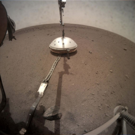 NASA’s InSight lander has its seismic instrument tucked under a shield to protect it from wind and extreme temperatures. (Credit: NASA/JPL-Caltech)