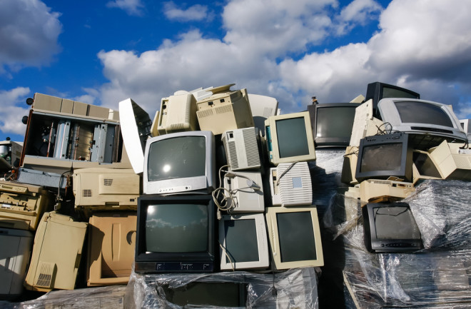old tvs stacked up - shutterstock