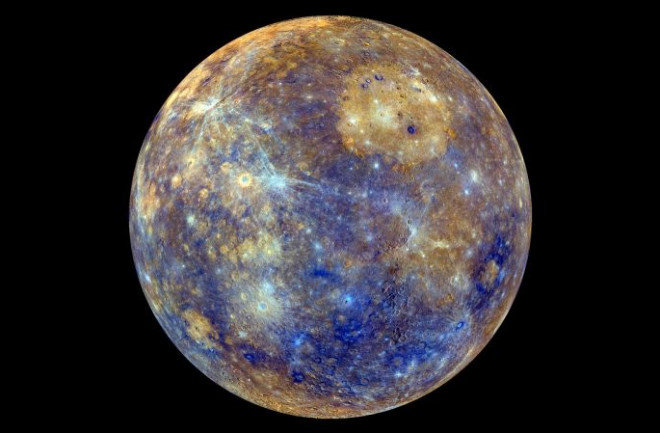 Mercury in false color, to visually enhance the chemical, mineralogical and physical differences between the rocks that make up Mercury’s surface. Image via NASA/JHU-APL/Carnegie Institution of Washington. 