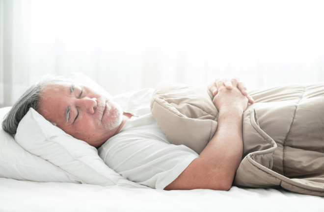Old Person Sleeping - Shutterstock