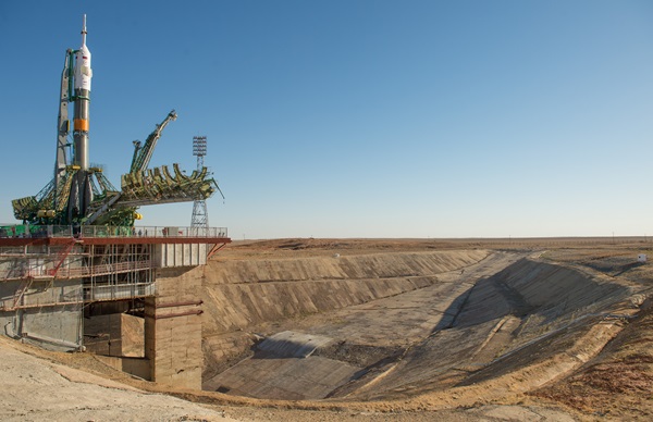 Rocket launch from cosmodrome. Fight of space rocket in blue sky