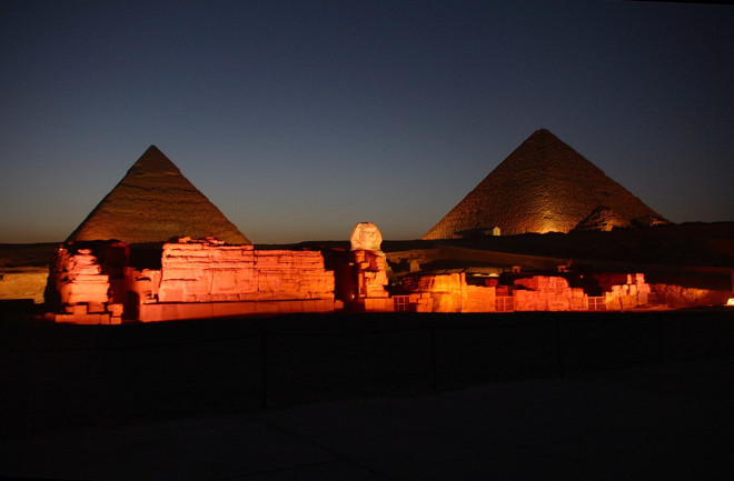 giza pyramid complex at night 