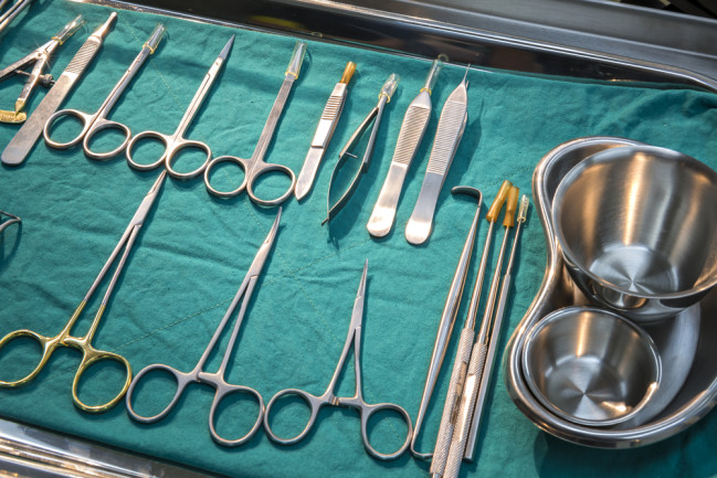 medical instruments on a table - shutterstock
