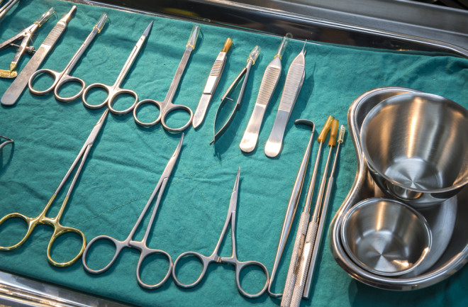 medical instruments on a table - shutterstock