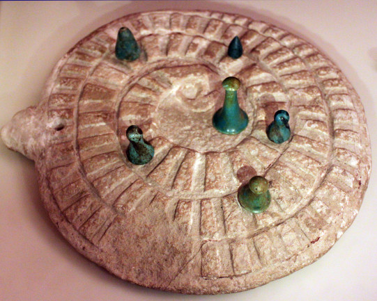 Mehen game with game stones, from Abydos, Egypt, 3000 BC, Neues Museum - Wikimedia Commons