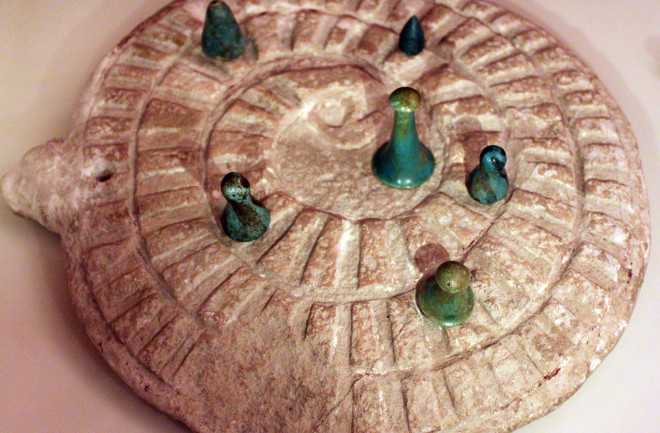 Mehen game with game stones, from Abydos, Egypt, 3000 BC, Neues Museum - Wikimedia Commons