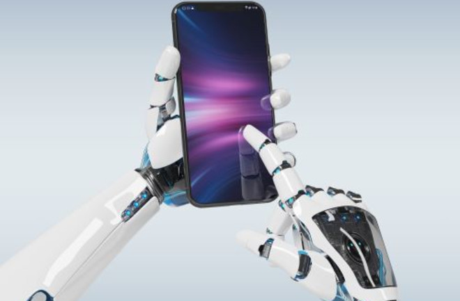 Robot hands using smartphone - Shutterstock