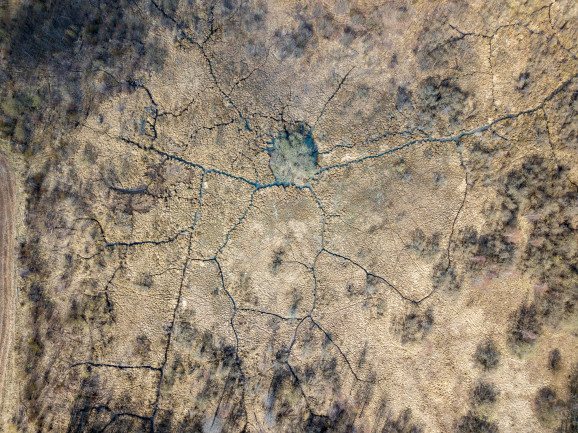 Aerial view of a dried-up country river bed