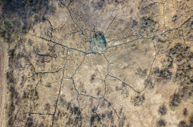Aerial view of a dried-up country river bed