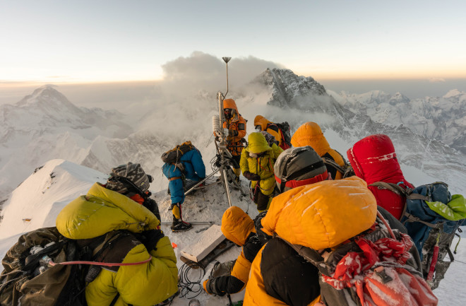 Baker Perry (along with Tom Matthews and a team of Sherpa guides) set up their weather station at the Balcony on Mount Everest. (Credit: National Geographic Society/Mark Fisher)