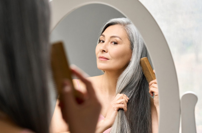 older-woman-with-nice-gray-hair-looking-in-mirror