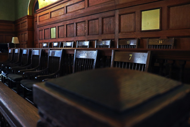jury box in the courtroom - shutterstock