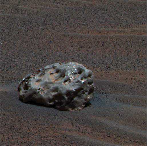 a pitted metallic rock