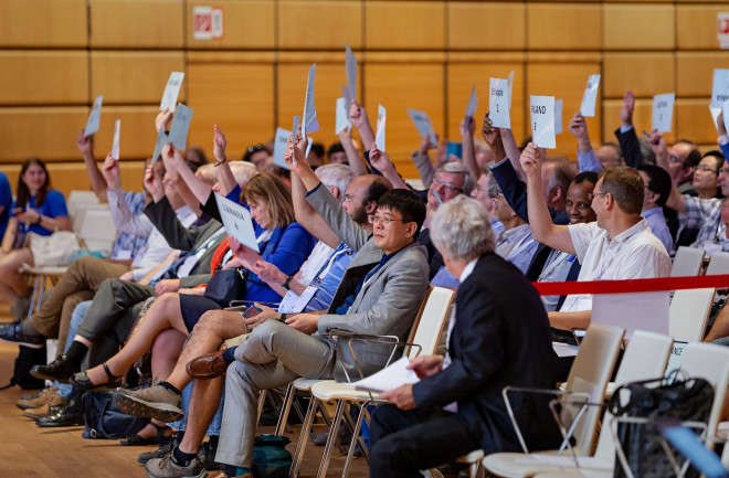 National Members of the IAU vote at tje 2018 General Assembly (not related to the Hubble–Lemaître law). (Credit: IAU/M. Zamani)