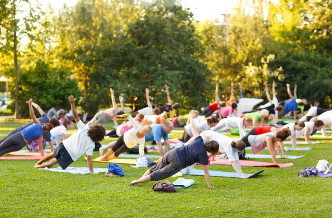 people doing yoga outdoors