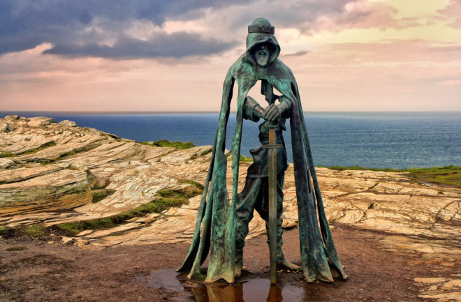 The King Arthur statue stands beside the Atlantic coast of Cornwall, Great Britain. (Credit: Gary Perkin/Shutterstock)